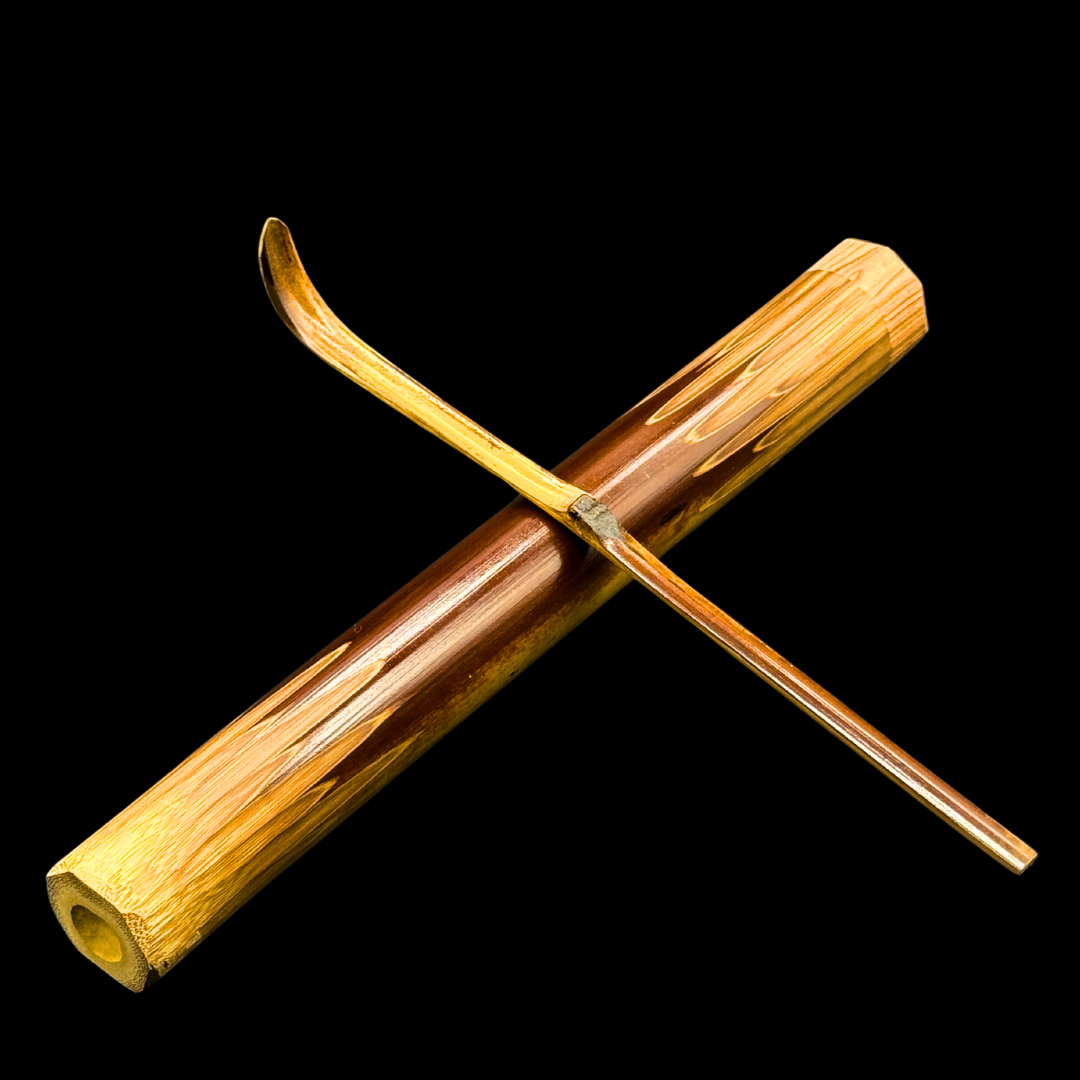 Emptea Katana Smoked Bamboo Scoop with a traditional tea chest (Chashaku 刀)