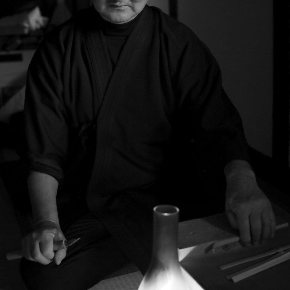 Emptea Katana Smoked Bamboo Scoop with a traditional tea chest (Chashaku 刀)